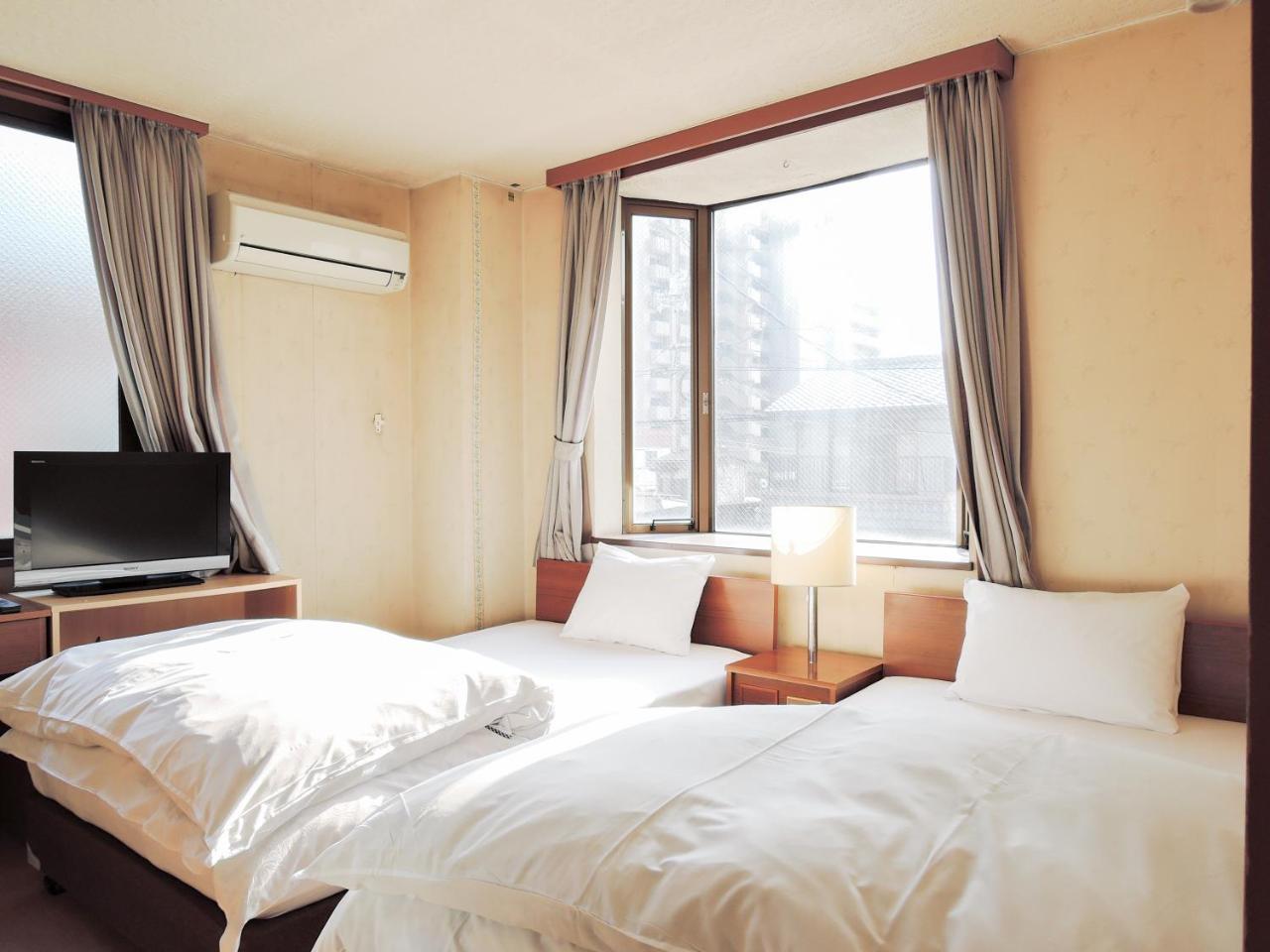 Green Business Hotel Фукуяма Екстер'єр фото